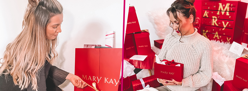 zelfstandige schoonheidsconsultants met Mary Kay dragen, versieren en stapelen in rood cadeaupapier verpakte kerstcadeaus en vullen Mary Kay adventskalenders