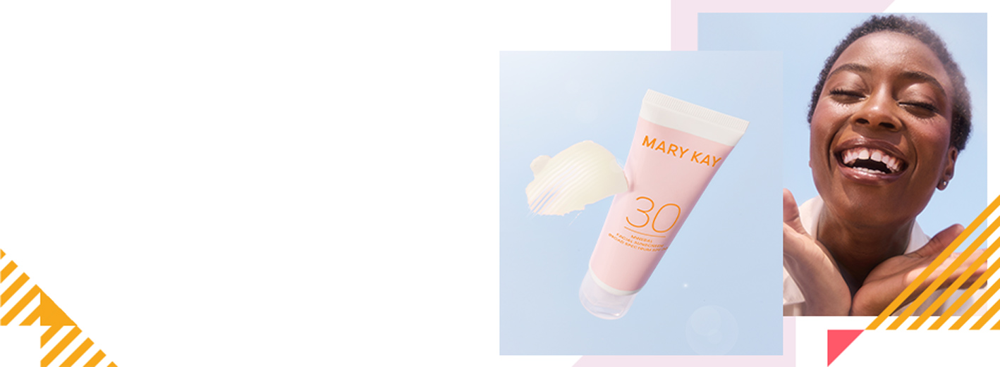 Een lachende vrouw met een donkere huidskleur tegen een lichtblauwe achtergrond. Naast haar zie je de nieuwe Mineral Sun Care SPF 30 van Mary Kay.