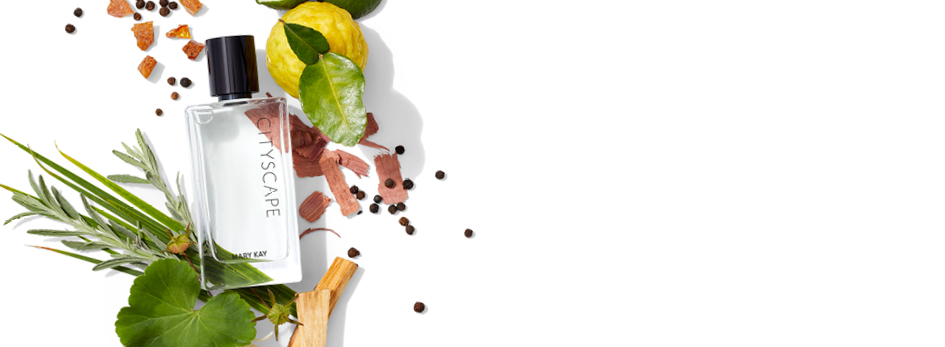 De flacon van Cityscape Men Cologne Spray van Mary Kay en een aantal vruchten, kruiden enz. die de topnoot, hartnoot en basisnoot van de geur vormen