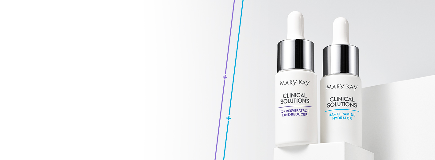 De nieuwe Clinical Solutions Booster van Mary Kay tilt uw huidverzorgingsroutine naar een hoger niveau. De twee witte flessen staan samen op een witte sokkel tegen een grijze achtergrond.