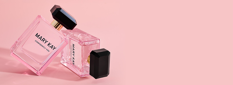 Flycons van Confidently You tegen een lichtroze achtergrond